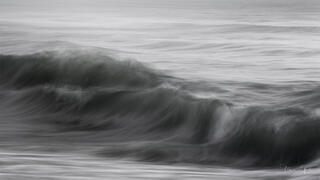 Florida wave captured with intentional camera movement in black and white, soft brushstroke tones, painterly quality, fine art photography by Tamara Gooch.