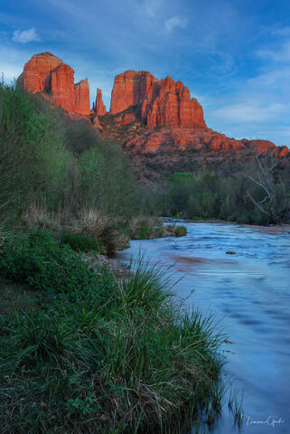 Fine art landscape of Sedona's Cathedral Rock at sunset reflected in a blue river by Tamara Gooch.