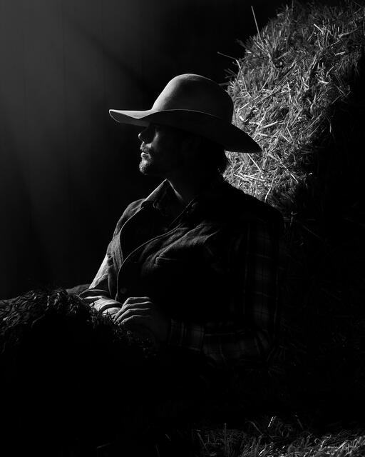 Hay Bale — Cowboy Portrait in Dramatic Light, American West print