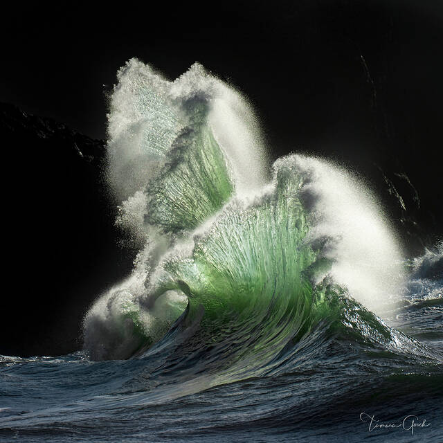 Fine art limited edition photograph of Fan Waves in the ocean shown printed on Chromalux museum quality metal for a superior presentation.