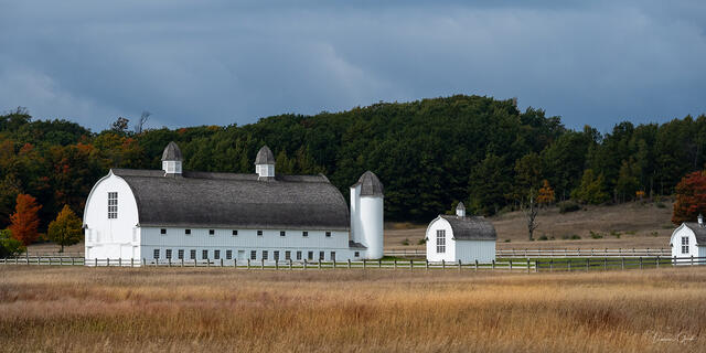 white barn in michigan landscape fine art photography print with autumn trees and open field