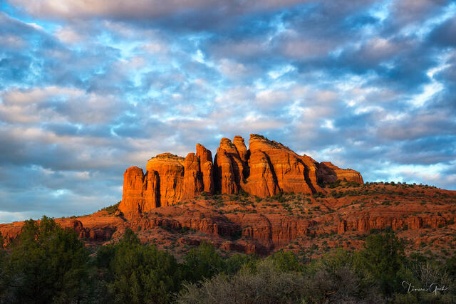 Wall art limited edition print "Sedona Magic" the red rocks of Sedona glowing as the sunsets beneath stormy skies.