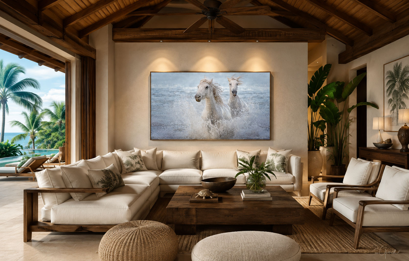 Born of the Sea, two white Camargue horses running through breaking surf, hung above a cream sectional in a beamed tropical living room